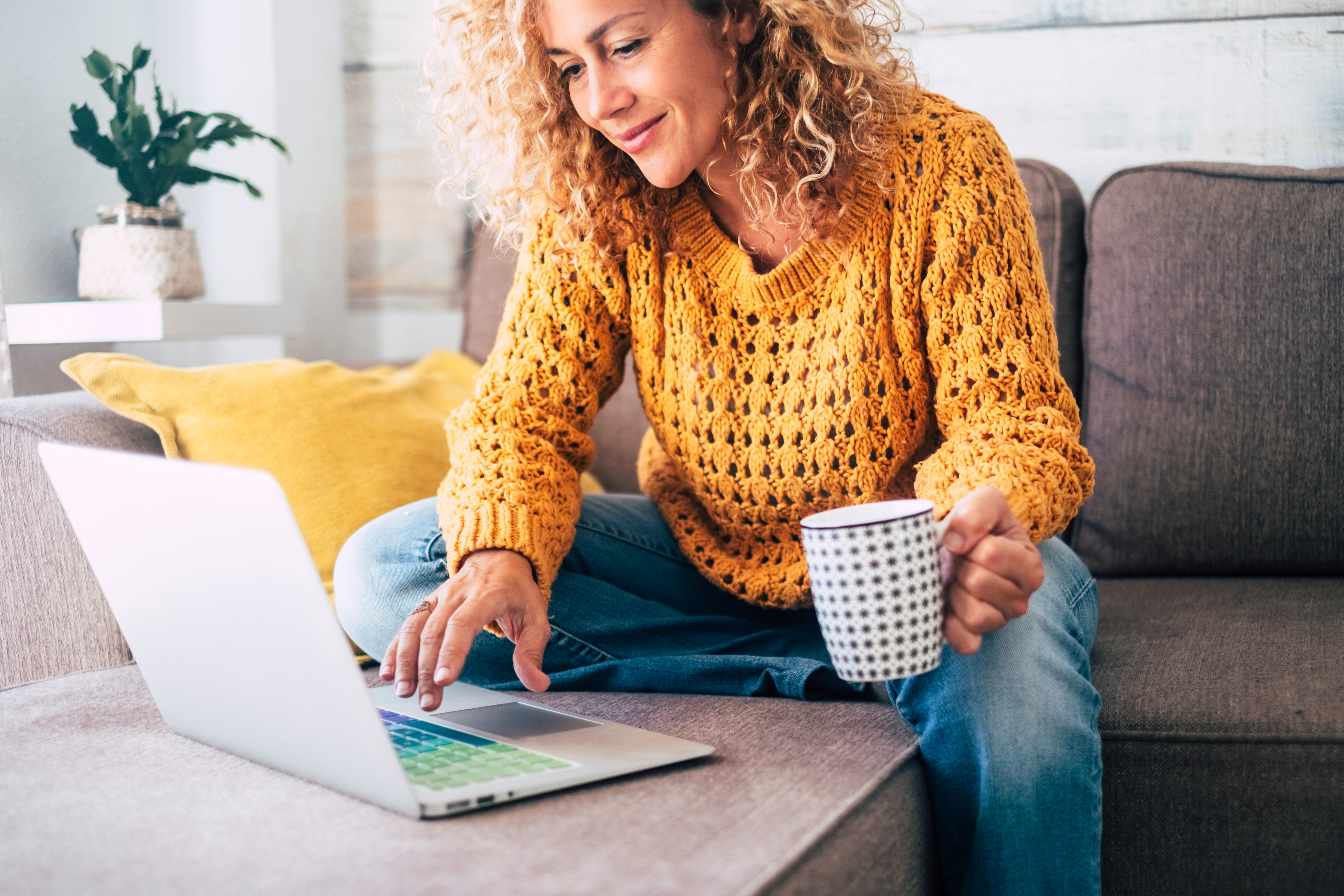 Young woman looking at laptop