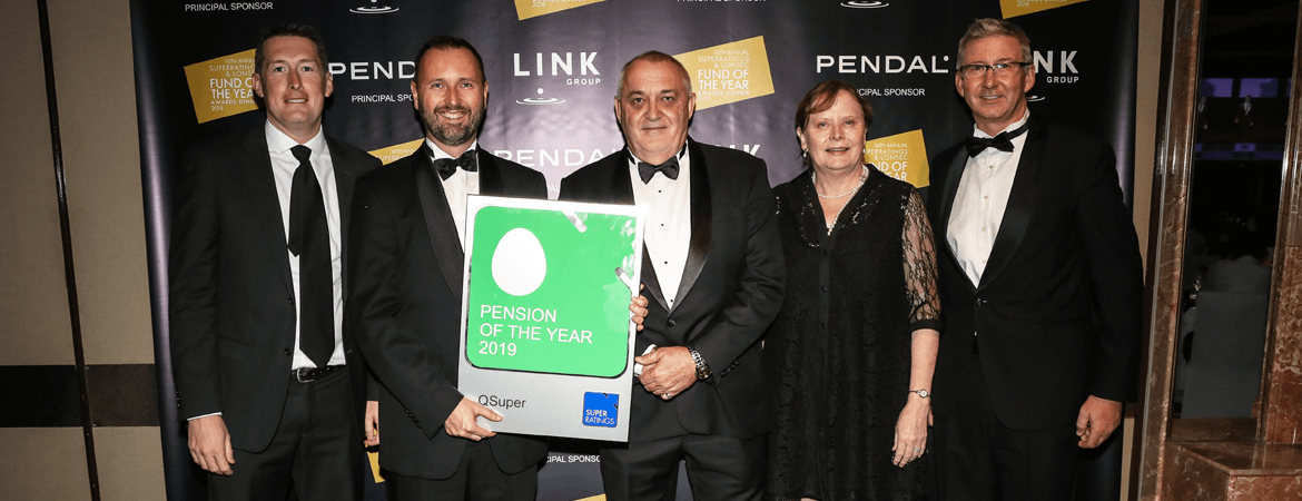 From left to right: a man in a black suit and tie next to two men in black suits with bowties holding a green 'Pension of the year 2019' award for QSuper, standing next to a woman wearing black and another man in a black suit and bowtie.