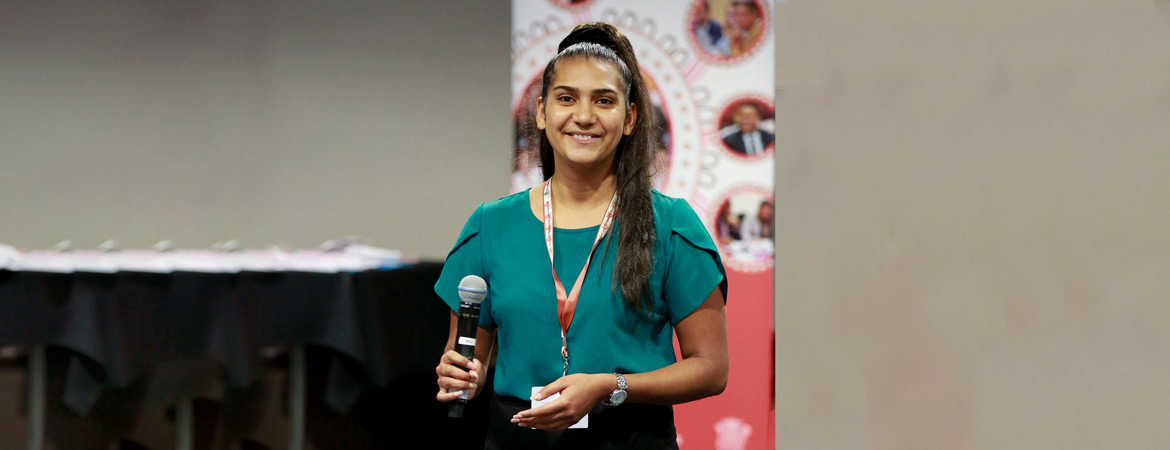 Young female holding microphone