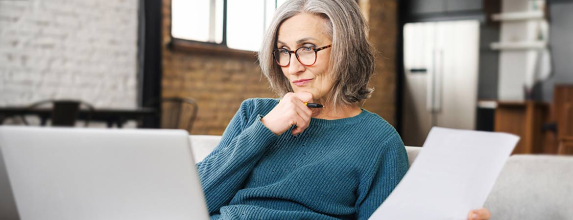 woman looking at laptop