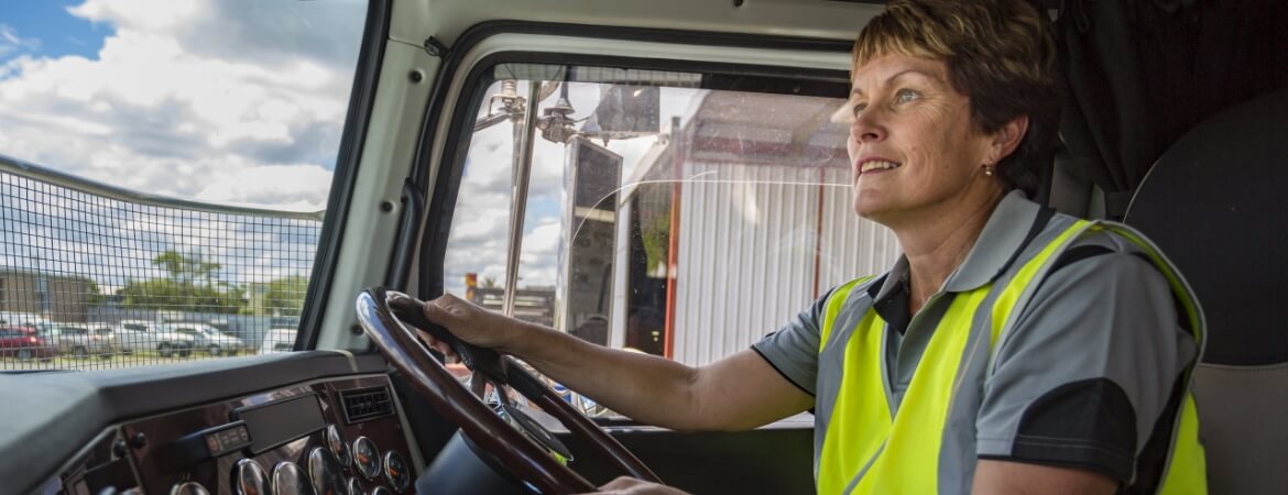 Woman driving truck feeling confident